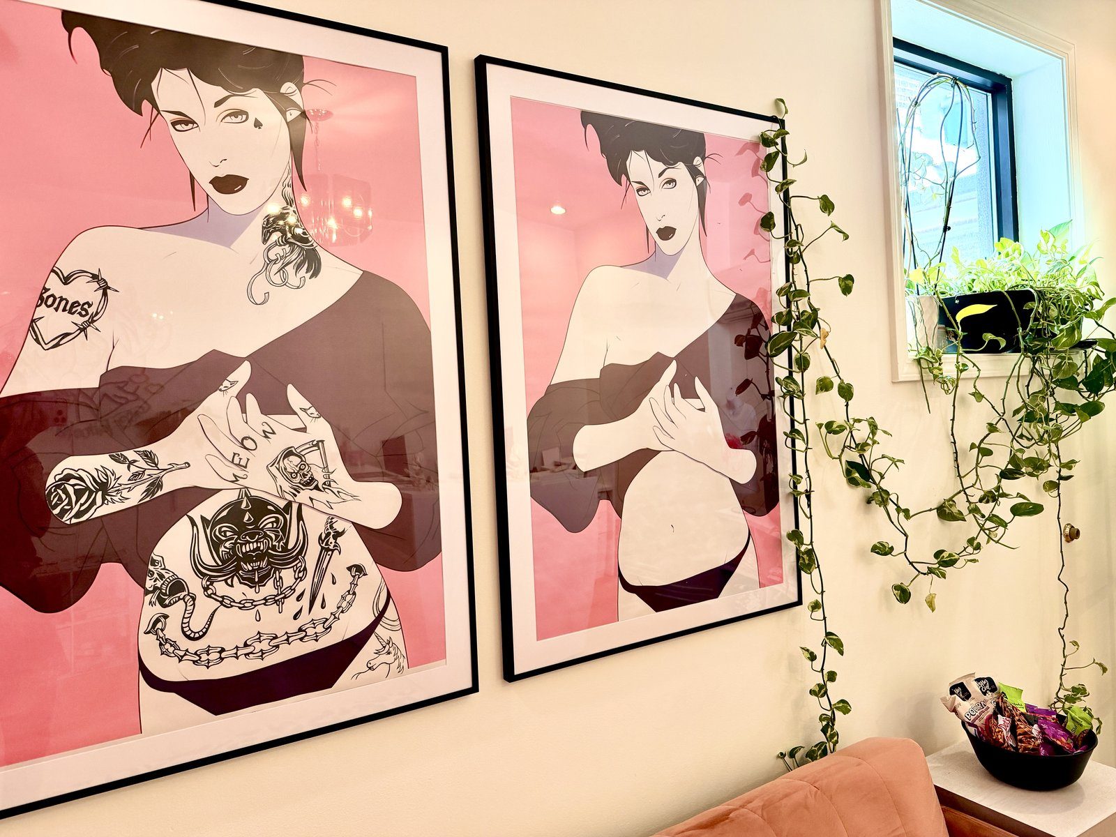 Framed art prints on the wall at Goodbye Rhonda