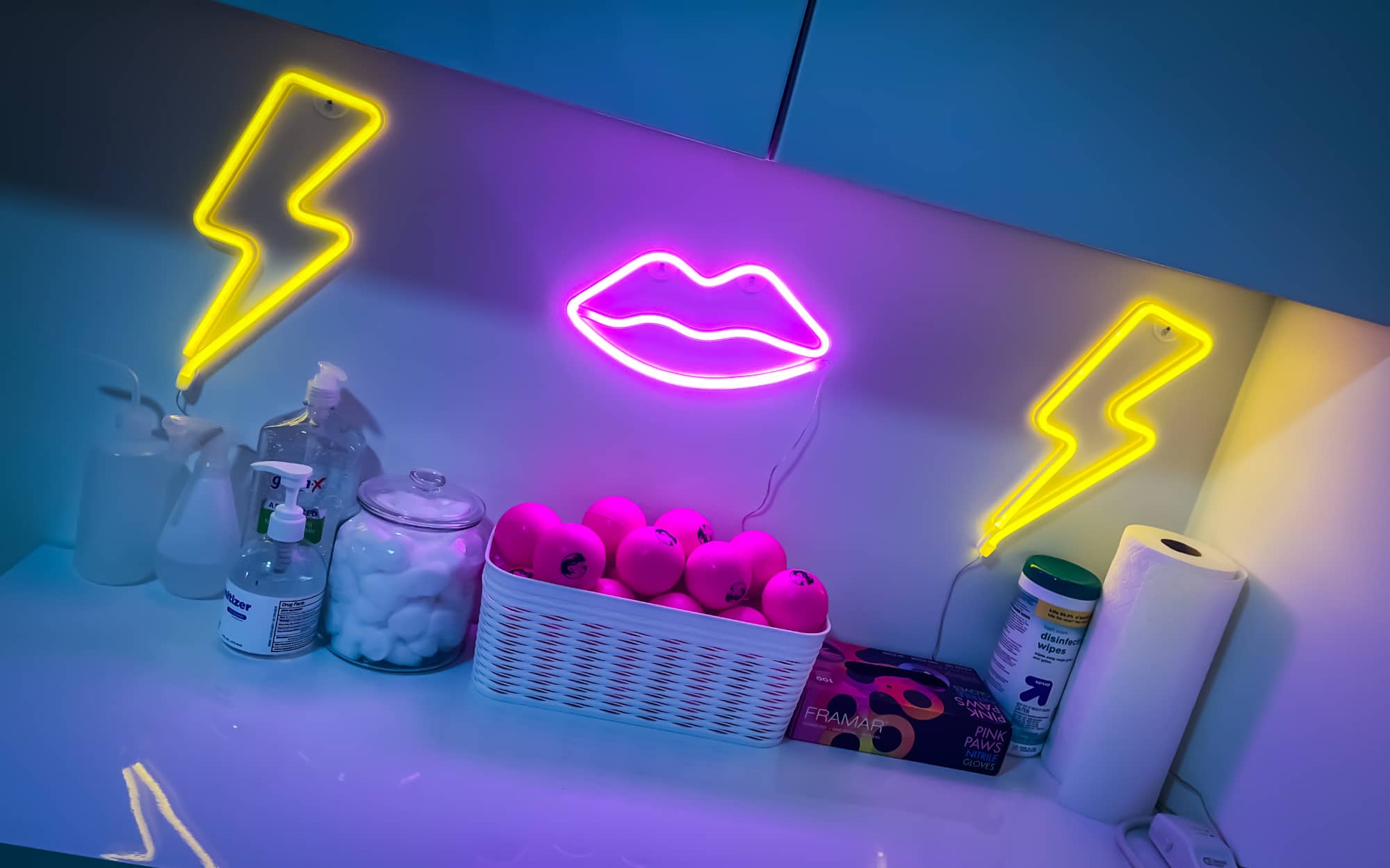 Pink neon lips and decor at Goodbye Rhonda