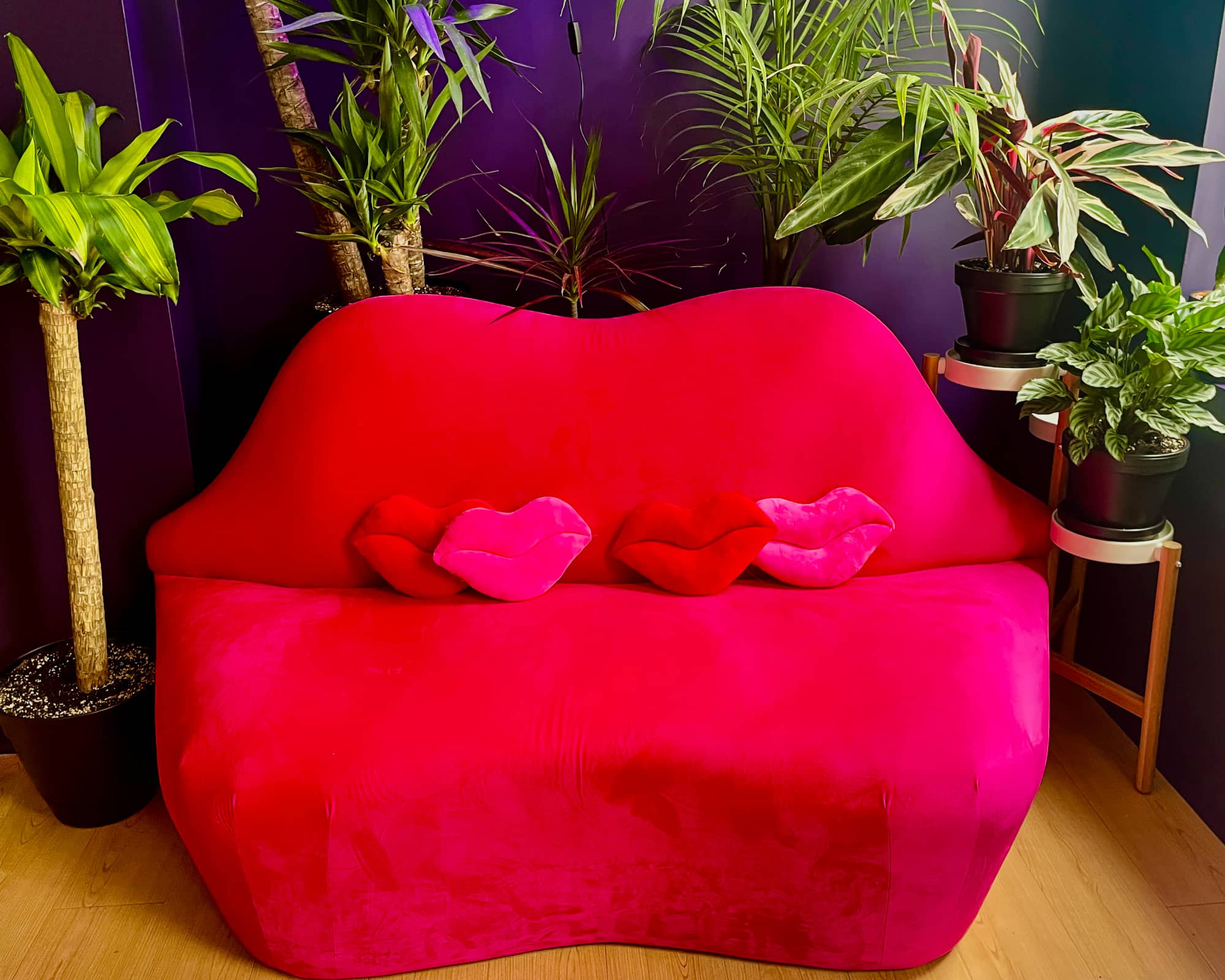Hot pink lips couch in the Goodbye Rhonda waiting area